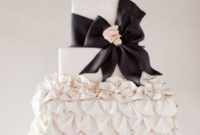 Elegant Black and Ivory Ruffle Cake