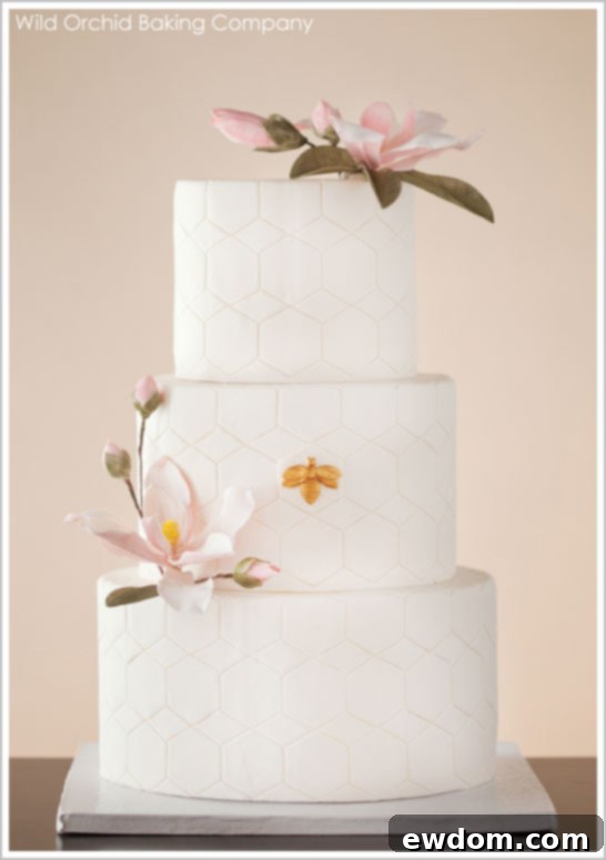 Exquisite Honeycomb & Gilded Bee Wedding Cake Honeycomb & Golden Bee Wedding Cake - Elegant White Design
