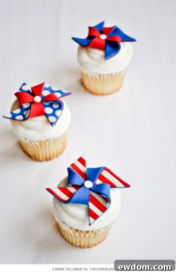 DIY Patriotic Pinwheel Cupcakes in Red, White & Blue, featuring striped and polka dot designs