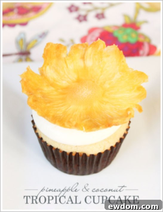 Tropical Pineapple Cupcakes with elegant dried pineapple flowers by Lauren Kapeluck | TheCakeBlog.com