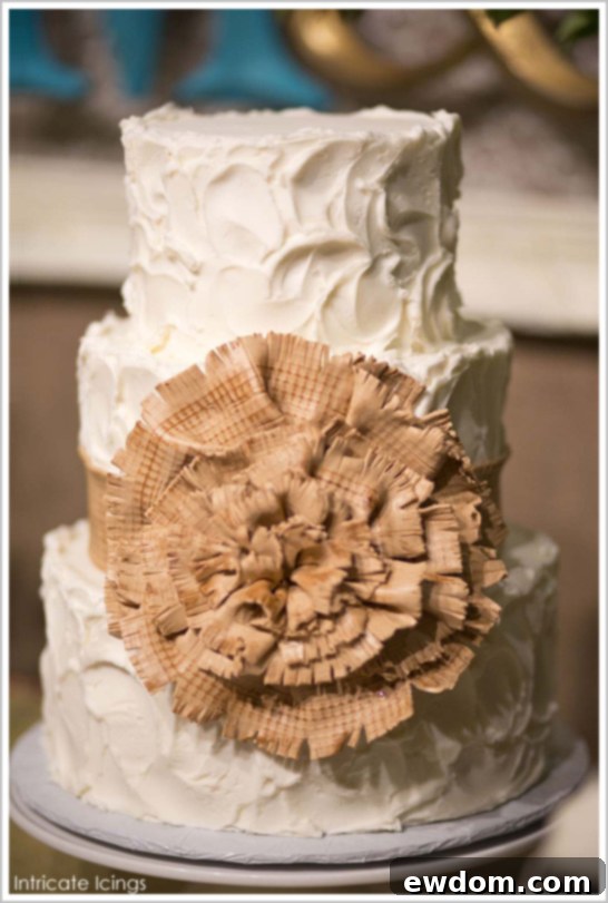Detailed View of Edible Burlap Bow on Wedding Cake by Intricate Icings