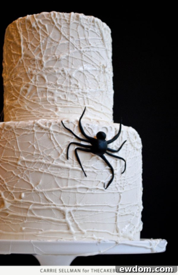 Spooky Marshmallow Web Cake 3 Melted Marshmallows for Halloween Spiderweb Cake | Step-by-Step Guide by Carrie Sellman