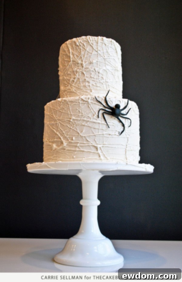 Spooky Marshmallow Web Cake 5 Finished Marshmallow Spiderweb Cake with Fondant Spider | Halloween Dessert Idea