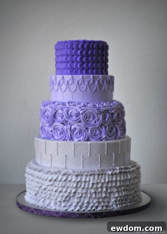 Stunning Purple Ombre Buttercream Cake by Fat Girl Cakes, showcasing advanced piping techniques.