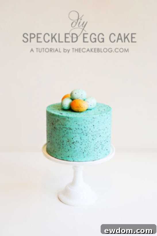 Flecked Fable Cake 4 A three-tier Speckled Easter Egg Cake adorned with decorative speckled eggs on top, ready for celebration. | by Carrie Sellman for TheCakeBlog.com