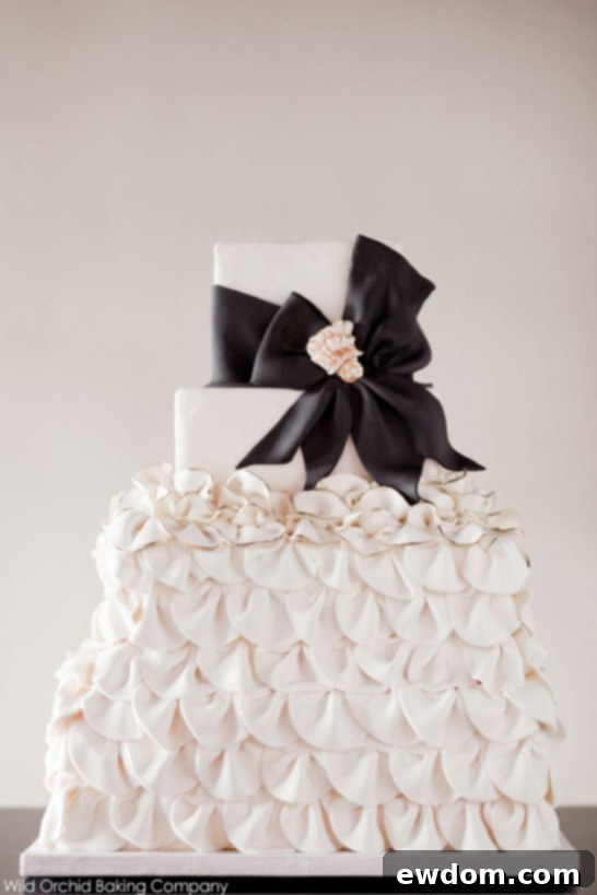 Elegant Black and Ivory Ruffle Cake 2 Luxurious Black & Ivory Ruffle Wedding Cake by Wild Orchid Baking Co | Elegant Bridal Cake Ideas