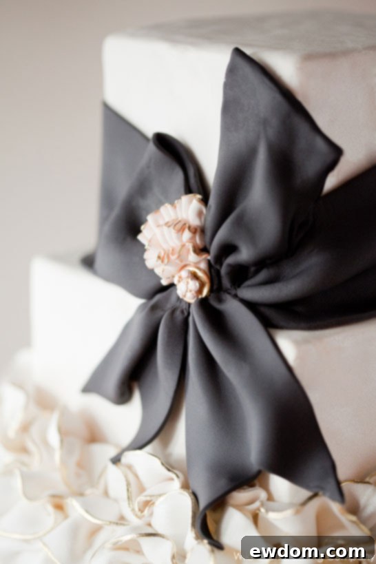 Elegant Black and Ivory Ruffle Cake 5 Exquisite Ruffle Cake with Black & Ivory Theme for Elegant Weddings by Wild Orchid Baking Co