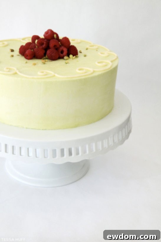 Pistachio Cake with White Chocolate & Raspberries by Tessa Huff | TheCakeBlog.com