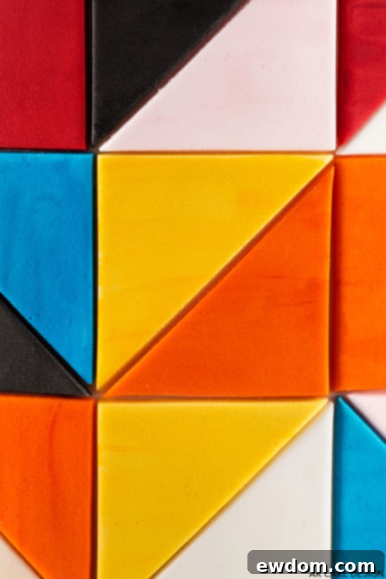 Process shot of painting fondant pieces for the color block cake