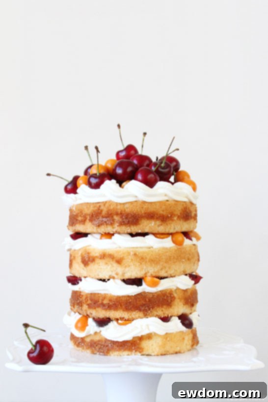 Finished Fresh Cherry and Gooseberry Cake with Almond Whipped Cream | TheCakeBlog.com