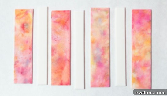 Cutting and Applying Painted Fondant Shapes to a Cake