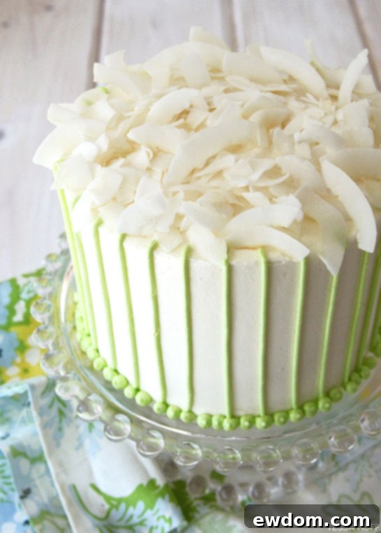 Tropical Coconut Lime Cake 6 Decorated Coconut Lime Cake on a cake stand