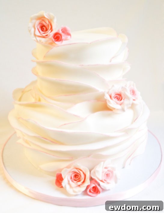 Exquisite Rose Petal Wedding Cake by Steel Penny Cakes, a masterpiece of fondant artistry