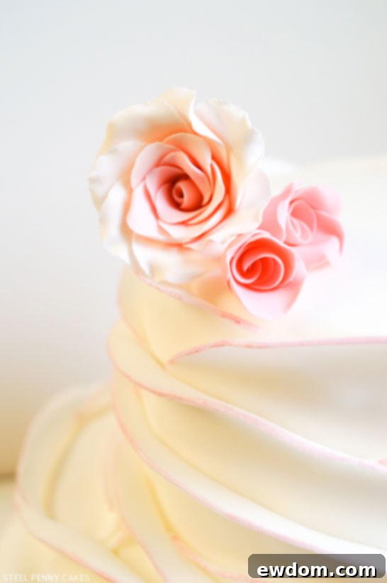 Detail shot of the exquisite Rose Petal Cake by Steel Penny Cakes, showcasing intricate fondant work