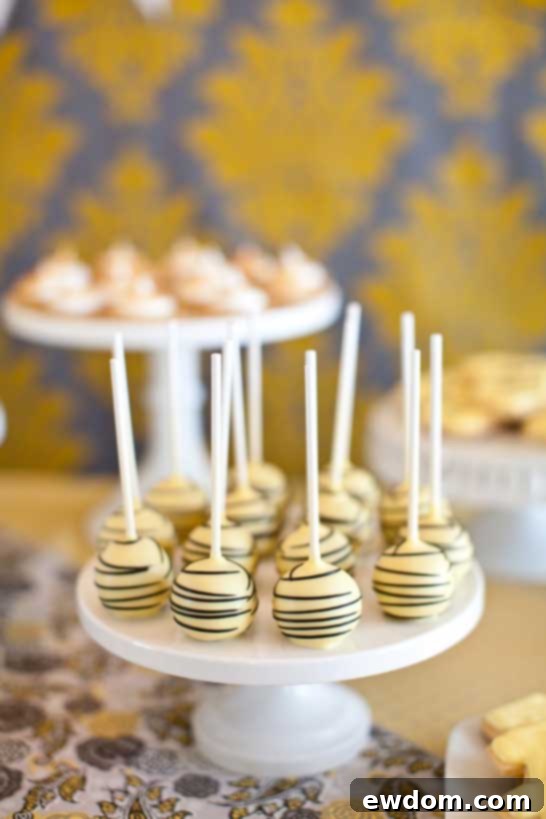 What Will It Bee? Baby Shower - Close-up of personalized bee-themed invitations and decor designed by Fishtale Photography