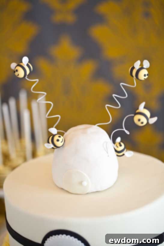 What Will It Bee? Baby Shower - Adorable onesie sugar cookies with tiny bee details, a perfect baby shower treat