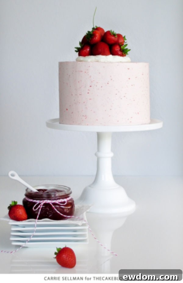 Strawberry Pie Cake Perfection 3 Strawberry Pie Cake | Graham Cracker Cake with Strawberry Buttercream and fresh berries | by Carrie Sellman for TheCakeBlog.com