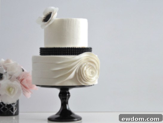 Flowing Rose Cake | by Sweet Charms | TheCakeBlog.com - Detail of the flowing rose bottom tier.