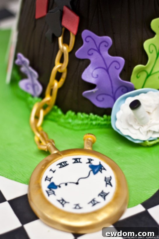 Base of the Wonderland Cake with black and white fondant tiles and other edible decorations