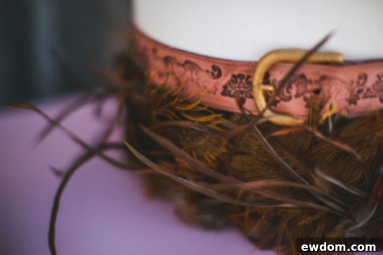 Hand-painted gold buckles on edible cake belts