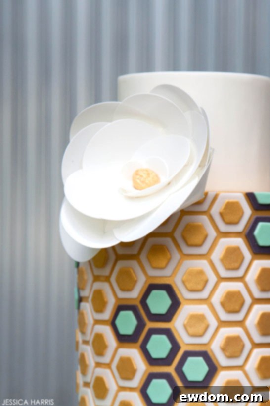 Detail shot of the Gold & Mint Hexagon Cake, showcasing geometric pattern precision