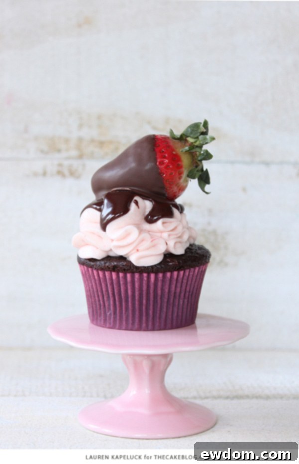 Luscious Strawberry Chocolate Cupcakes 7 A final close-up of a chocolate covered strawberry cupcake, highlighting its enticing layers