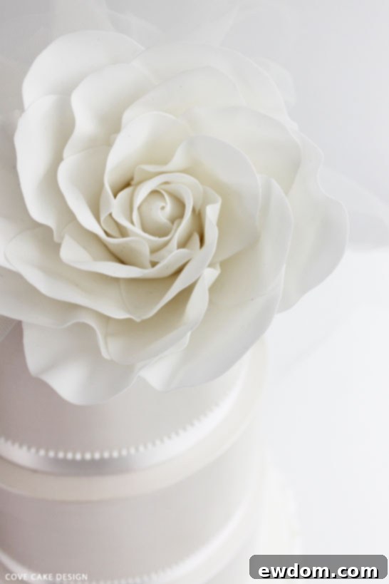 White Wedding Cake with Sugar Rose Detail by Cove Cake Design