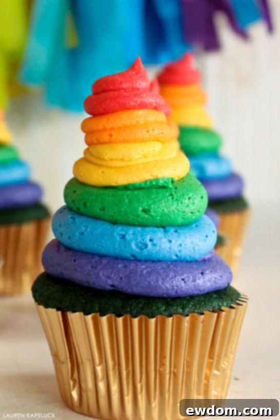 Green Velvet Cupcakes with rainbow buttercream | by Lauren Kapeluck | for TheCakeBlog.com
