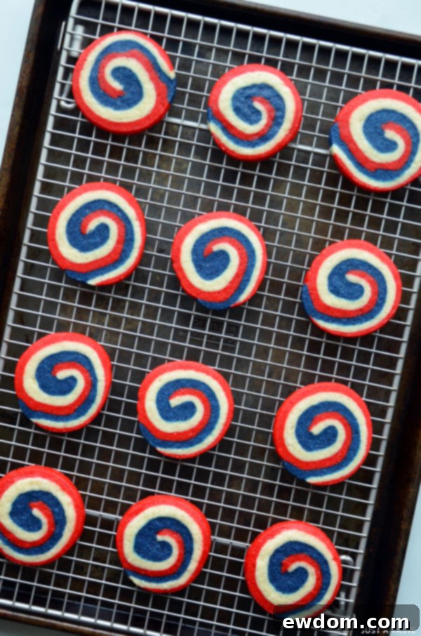 Colorful Red, White, and Blue Pinwheel Cookies, perfect for Fourth of July snacking