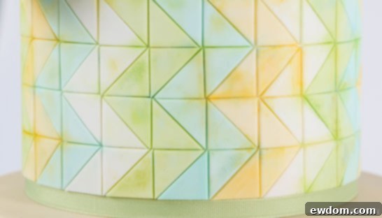 Detailed view of the hand-painted pastel zig-zag cake by AK Cake Design