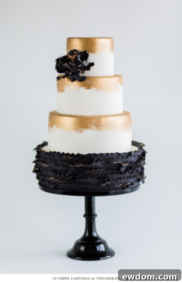 La Fabrik à Gâteaux Black Ruffled Cake with Gold Edging
