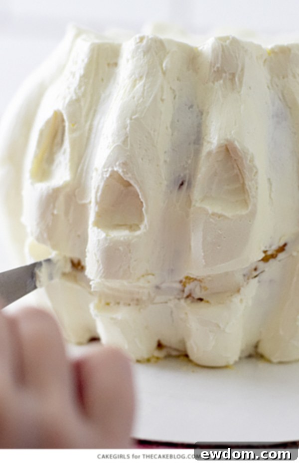 Detailed View of a Hand-Sculpted Jack O Lantern Cake by Cakegirls