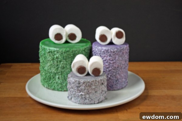 Attaching Marshmallow and Hershey's Kiss Eyes to Glammy Monster Cake