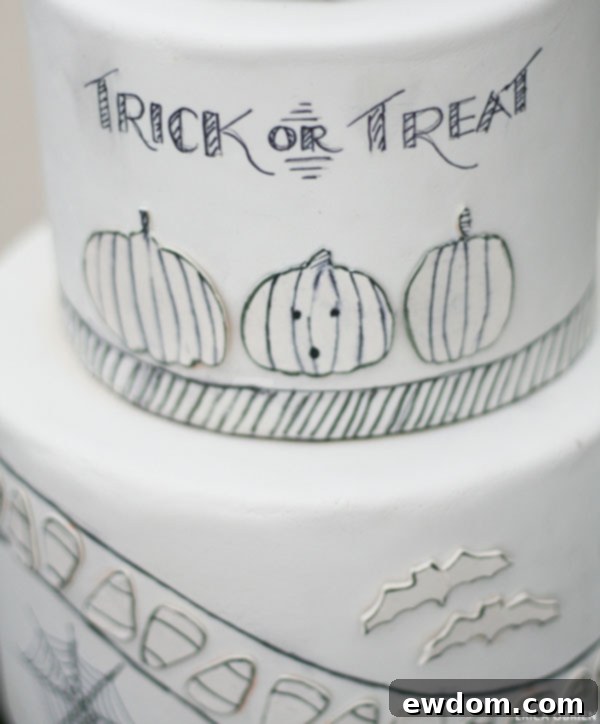 Artistic Details of a Black and White Illustrated Halloween Cake