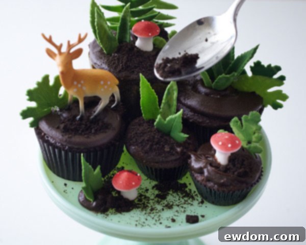 Sweet Little Worlds: DIY Cupcake Terrariums 16 Sprinkling chocolate wafer cookie crumbs over the finished cupcake terrarium for a soil effect.