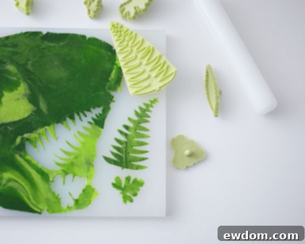 Sweet Little Worlds: DIY Cupcake Terrariums 10 Using leaf cutters to cut various shapes from the thin gum paste.