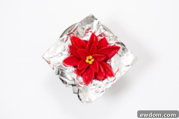 Removing the Dried Chocolate Poinsettia from its Foil Mold