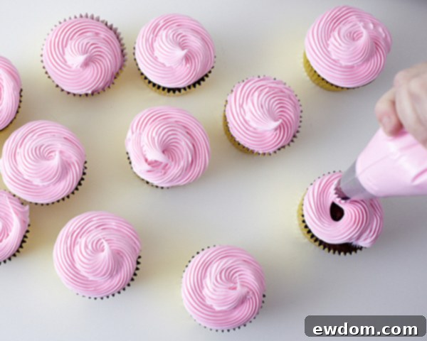 Frosted cupcakes ready for festive wreath assembly | Holiday dessert ideas