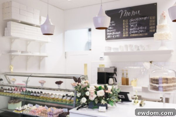 Jenna Rae Cakes Bakery Tour 5 A close-up of a beautifully decorated cake, highlighting intricate details and vibrant colors.