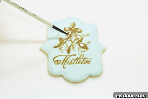 Mixing white petal dust with oil and painting the mistletoe berries