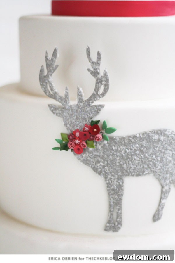 Delicate Fondant Flowers Adorning the Glittering Deer Silhouette Cake by Erica O'Brien