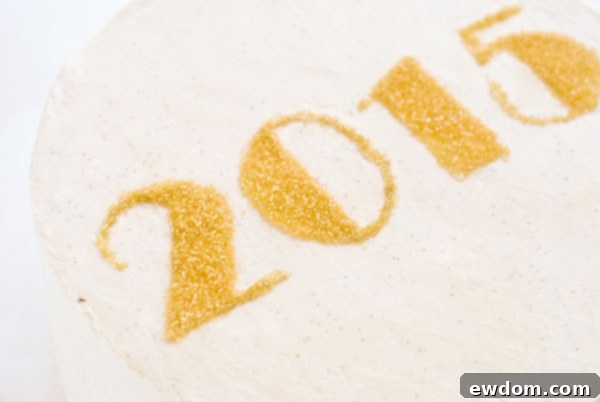 Sparkling Midnight Countdown Cake 20 Cleaning up stray sprinkles with a toothpick for a pristine finish