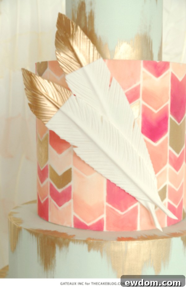 2015 Wedding Cake Trends | including this hand-painted chevron & gold cake by Gateaux Inc. | on TheCakeBlog.com