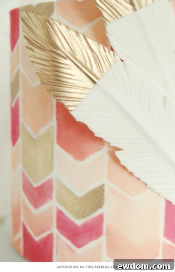 2015 Wedding Cake Trends | including this hand-painted chevron & gold cake by Gateaux Inc. | on TheCakeBlog.com