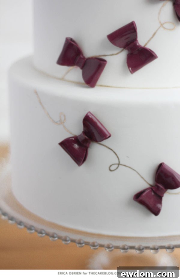 The Marsala Moment 7 Marsala & Gold Bow Cake | Elegant fondant bows with a sophisticated glaze finish | by Erica OBrien for TheCakeBlog.com