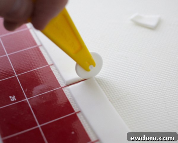 Valentines Candy Heart Surprise Cake 15 Cutting fondant strips into 4-inch segments for bow loops