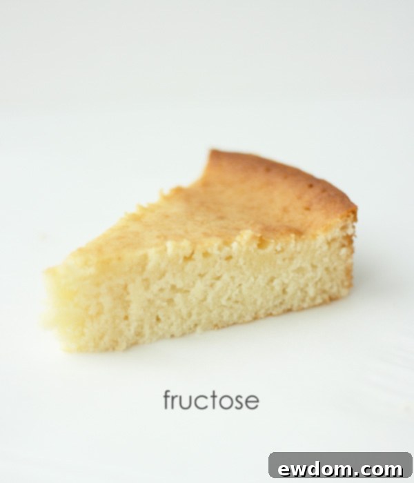 Comparison cake made with fructose, featuring enhanced browning, high moisture, and a tighter crumb