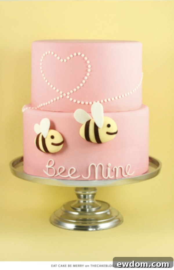 10 Cakes You'll Crave 9 Whimsical bumble bee cake with heart-shaped trails by Liz Shim of Eat Cake Be Merry, perfect for a playful Valentine's Day or engagement