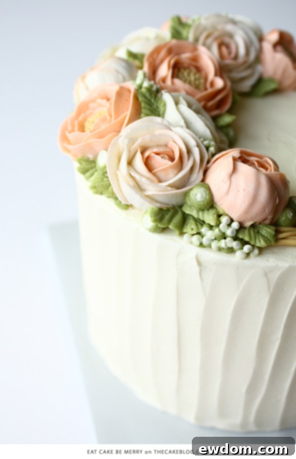 10 Gorgeous Flower Cakes to Welcome Spring 6 Delicate buttercream cake by Eat Cake Be Merry featuring hand-piped roses, peonies, and baby's breath.