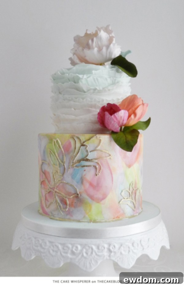 10 Gorgeous Flower Cakes to Welcome Spring 8 Dreamy watercolor floral cake by The Cake Whisperer with gold accents and dainty ruffles.